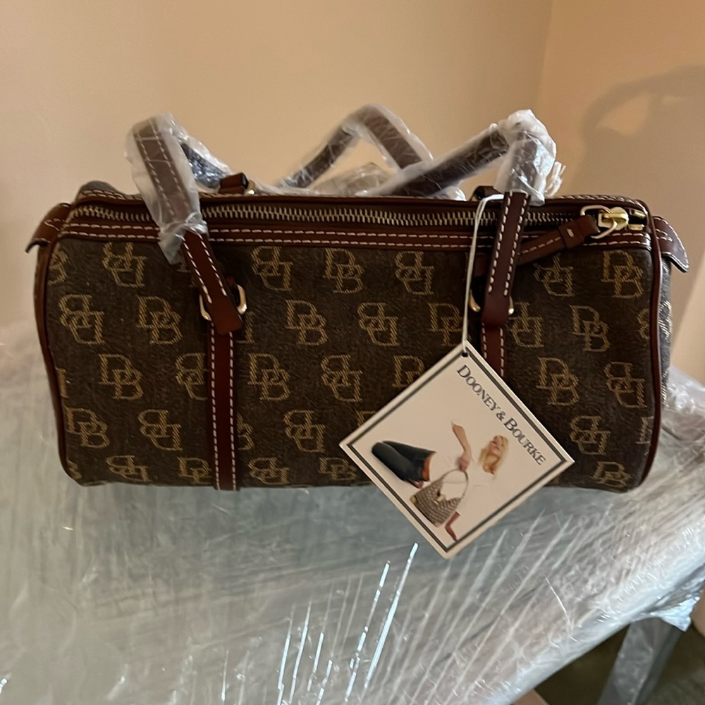 Dooney and Bourke barrel bag, new with tags!